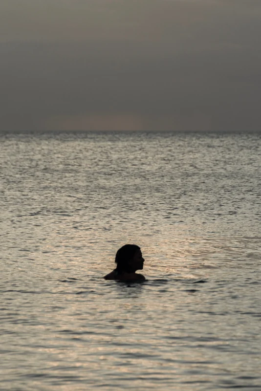 Swimming along the Gulf shore
